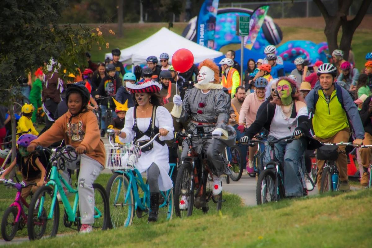 A crowd of costumed cyclists at the Zombie Bike Parade